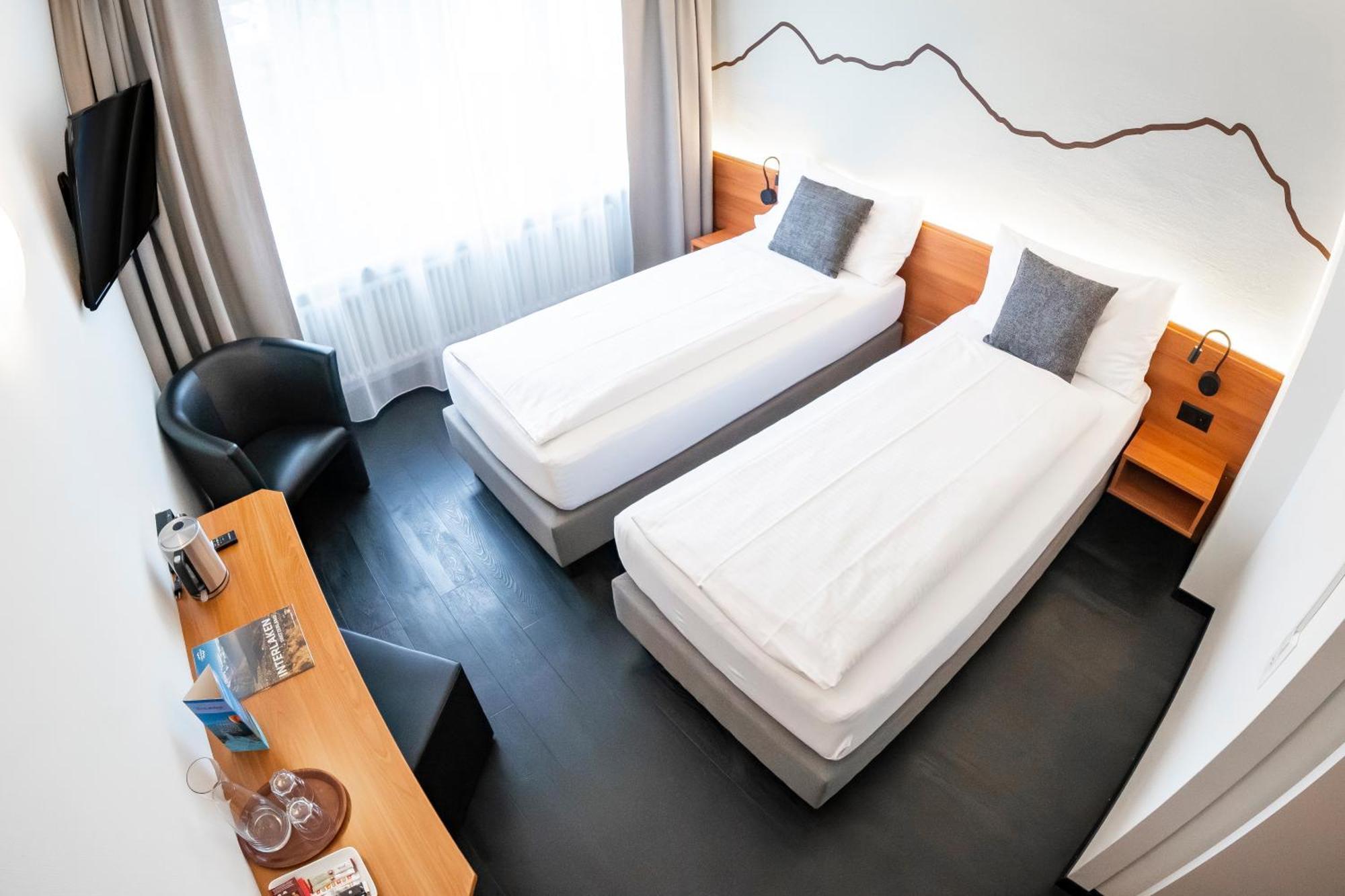 אינטרלאקן Hotel Merkur - West Station מראה חיצוני תמונה